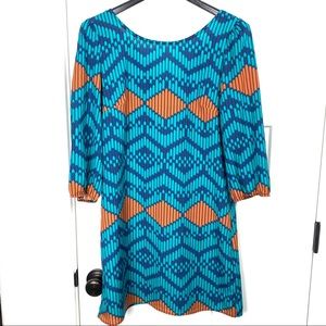 Buttons geometric medium exposed back zip dress